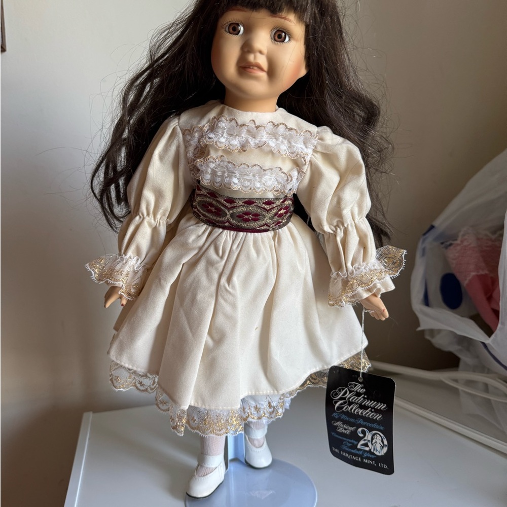 Vintage Elegant Porcelain Doll in Cream Dress